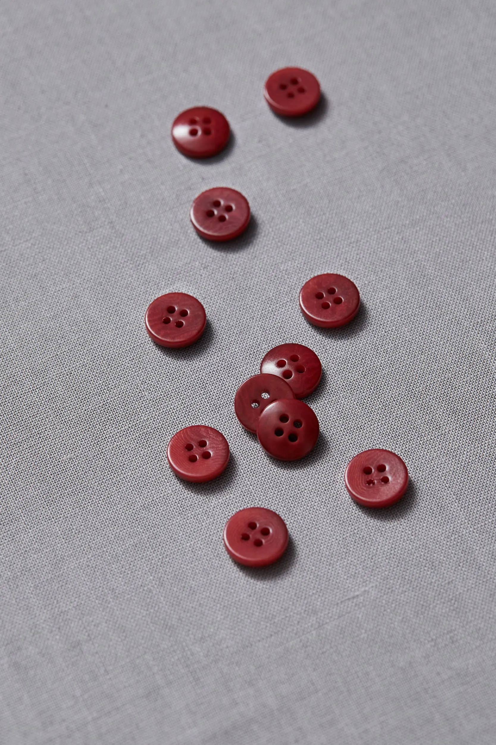 PLAIN 4 HOLE COROZO BUTTON |  Berry 11mm