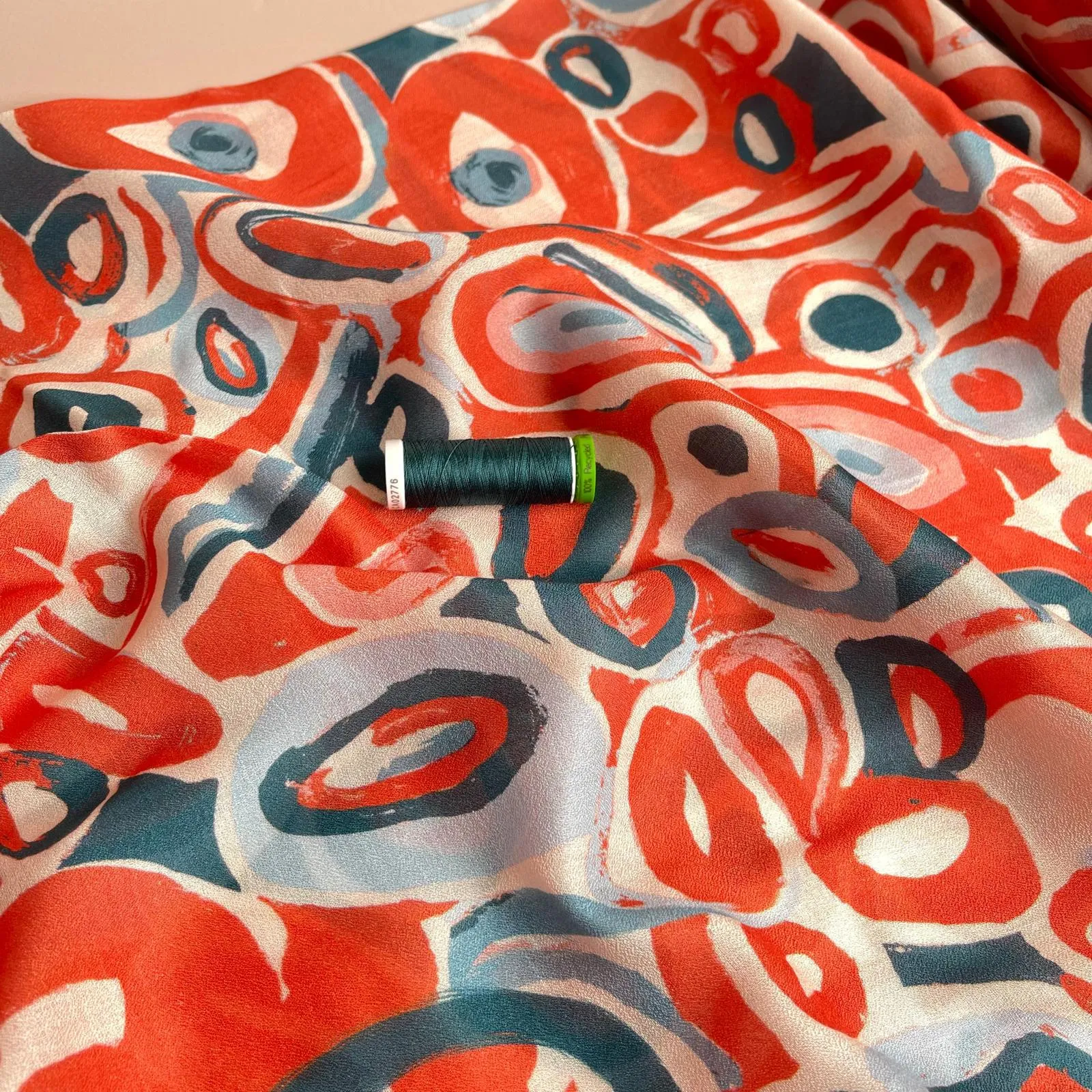 Slight sevledge fault - Coral Pebbles Viscose Fine Crepe Fabric