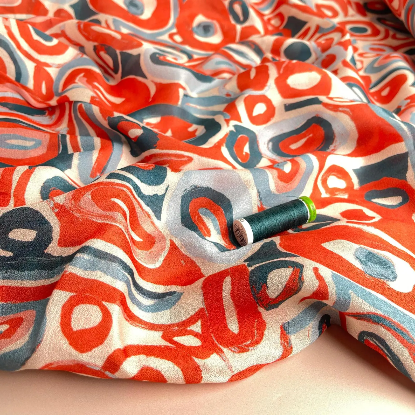 Slight sevledge fault - Coral Pebbles Viscose Fine Crepe Fabric