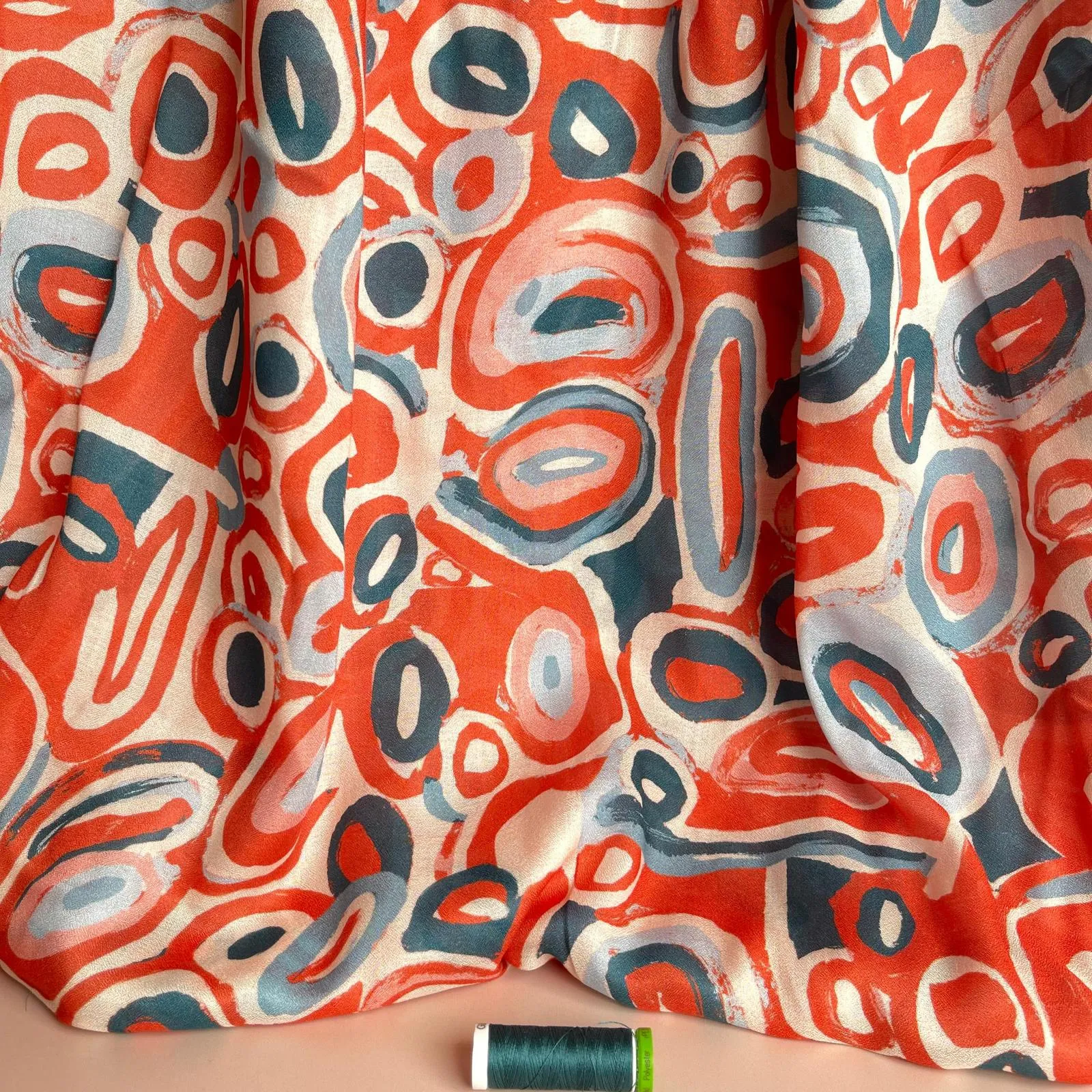 Slight sevledge fault - Coral Pebbles Viscose Fine Crepe Fabric