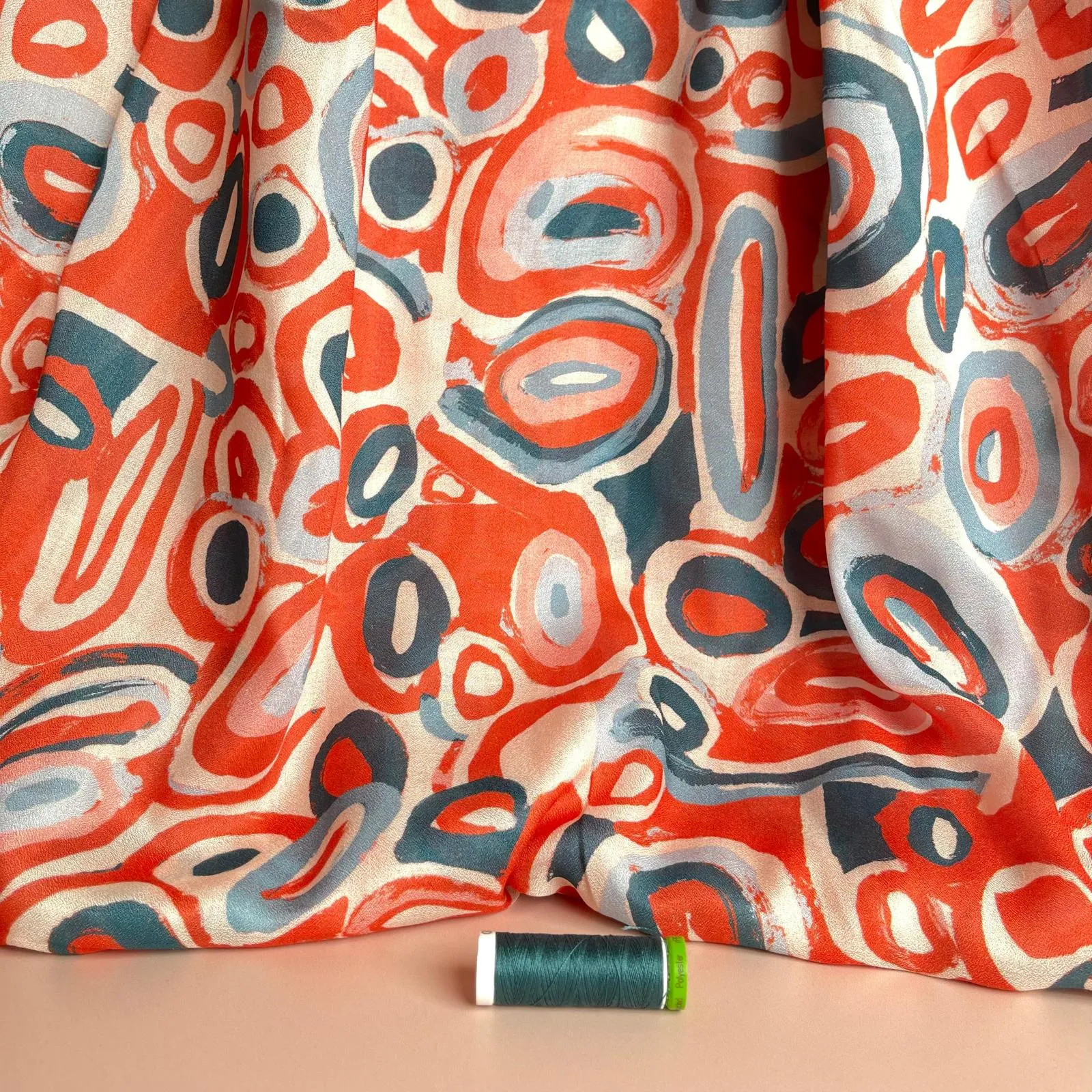 Slight sevledge fault - Coral Pebbles Viscose Fine Crepe Fabric