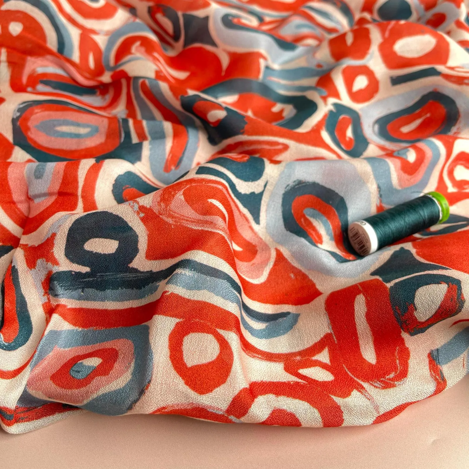 Slight sevledge fault - Coral Pebbles Viscose Fine Crepe Fabric