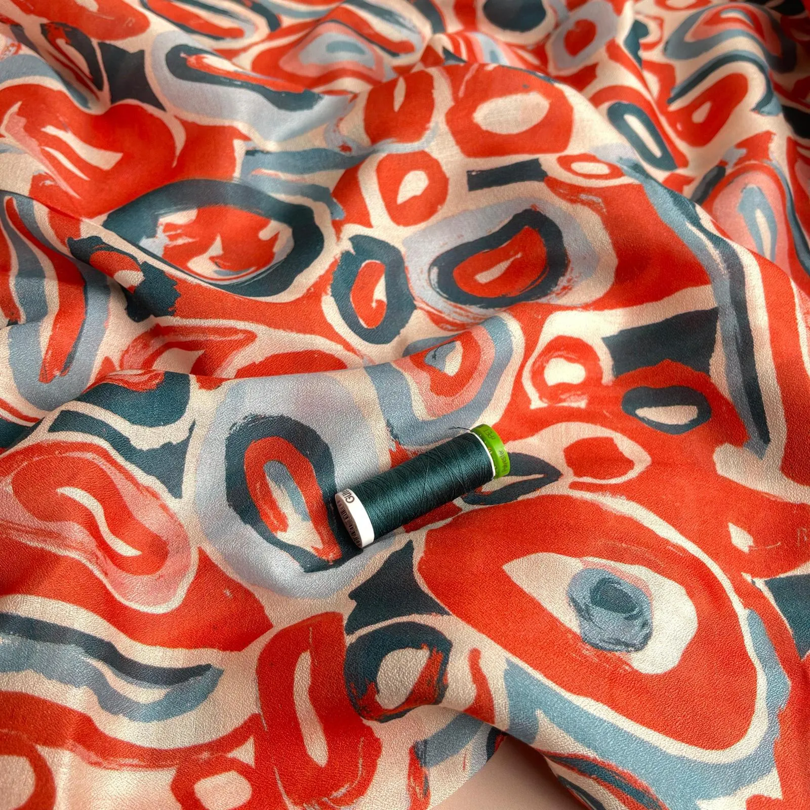 Slight sevledge fault - Coral Pebbles Viscose Fine Crepe Fabric