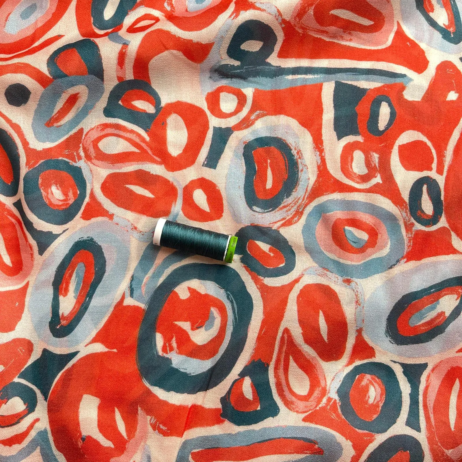 Slight sevledge fault - Coral Pebbles Viscose Fine Crepe Fabric