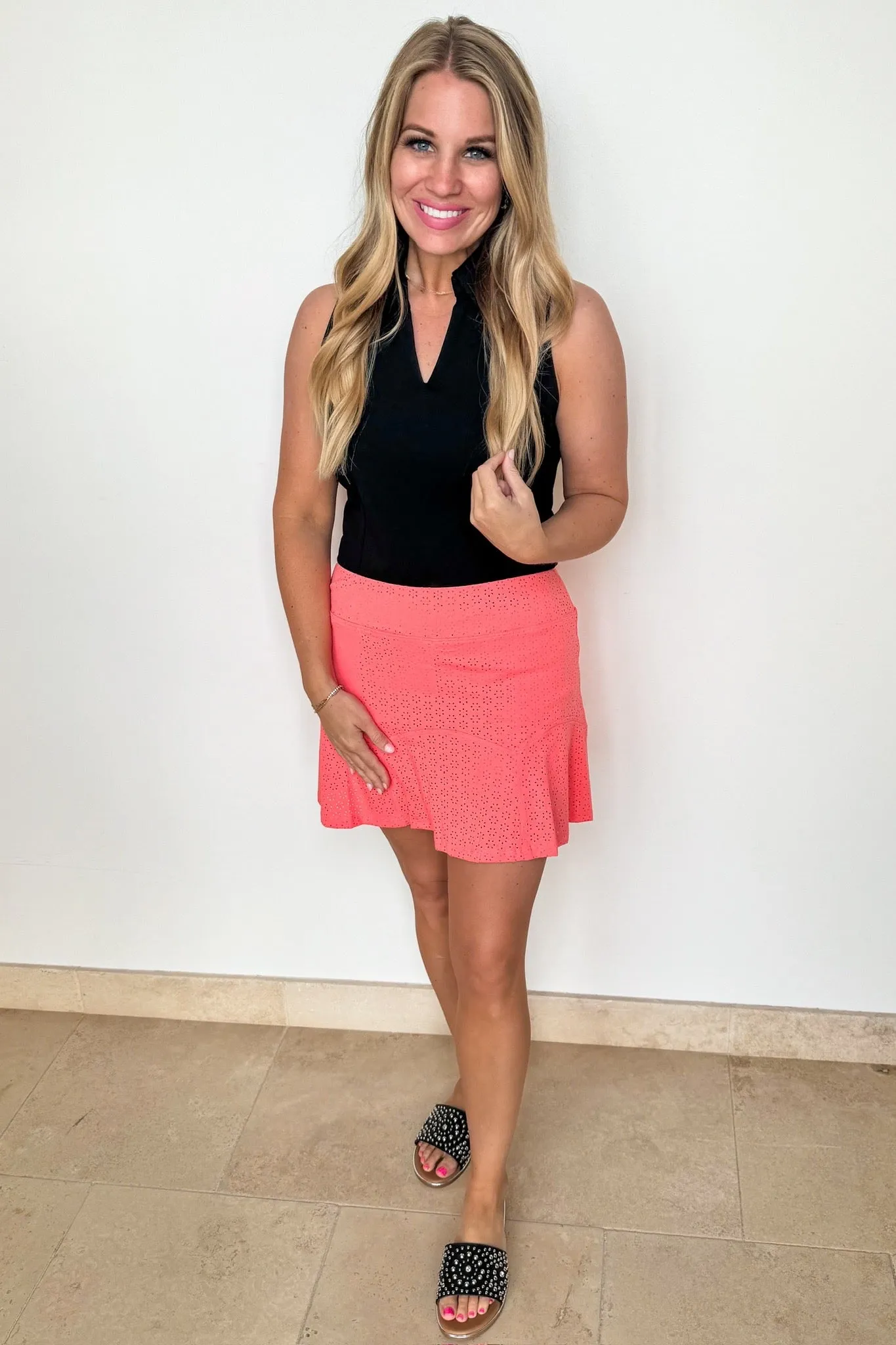 The Rosario Eyelet Pocketed Fit and Flare Skort in Coral